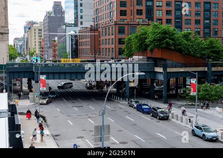 “Untitled (drone)” 2016-2021 is perched atop the spur section of the High Line in New York on Monday, May 31, 2021. The 48 foot wide sculpture, which will rotate in the wind, by the artist Sam Durant is part of his career path which is dedicated to projects about war, incarceration and other controversial subjects. (© Richard B. Levine) Stock Photo