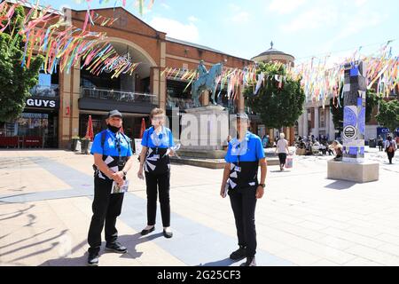 Coventry, UK, June 8th 2021. City of Culture hosts welcome visitors to colourful Broadgate in central Coventry, with the statue of the infamous Lady Godiva behind. Monica Wells/Alamy Live News Stock Photo