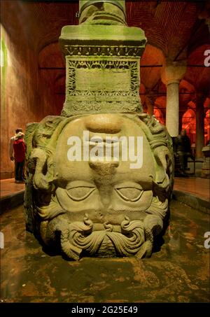 The Basilica Cistern, or Cisterna Basilica (Turkish: Yerebatan Sarnõcõ or Yerebatan Saray). Istanbul, Turkey. Here at the base of a column, a representation of Medusa, with serpents in her hair. The second Medusa head pillar Stock Photo