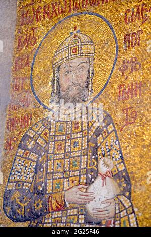 Detail of the Comnenus mosaic, Hagia Sophia (Turkish: Ayasofya), Istanbul, Turkey. Emperor John II Comnenus in garb embellished with precious stones, holding a purse, symbol of an imperial donation to the church. Byzantine art. Stock Photo