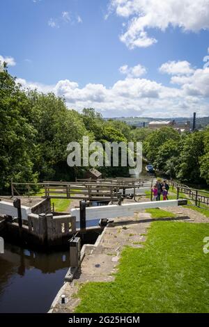 A view from the top of the famous five-rise locks on the Leeds and Liverpool canal in West Yorkshire Stock Photo