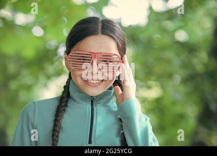 Girl wear fleece jumper for active leisure nature background, having fun concept Stock Photo