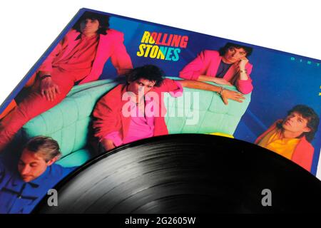 English rock band, The Rolling Stones music album on vinyl record LP disc. Titled: Dirty Work album cover Stock Photo
