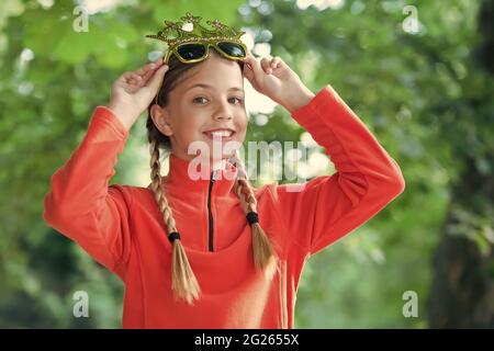 Girl wear fleece jumper for active leisure nature background, sunny day concept Stock Photo