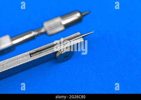Macro photo of drawing compass divider for geometry  Stock Photo