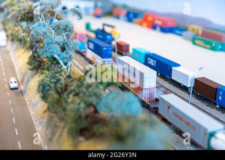 Double stacked freight containers on a model railway Stock Photo