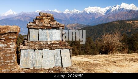 Buddhist prayer mani wall, tibetan buddhism in Nepal Stock Photo