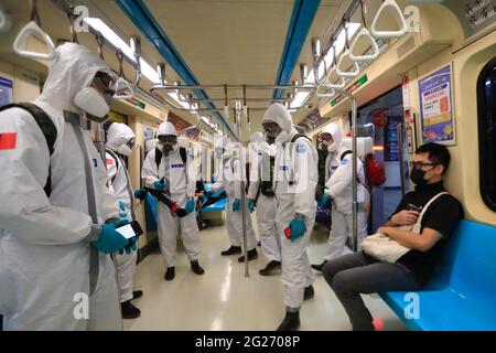 Taipei, Taiwan. 8th June, 2021. Taiwanese soldiers ride a subway train while disinfecting public areas and transport in Taipei, following a serious outbreak with an increasing number of domestic infections and deaths related to the COVID-19 disease. Credit: Daniel Ceng Shou-Yi/ZUMA Wire/Alamy Live News Stock Photo
