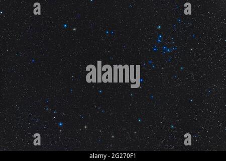 The constellation of Coma Berenices with the large open cluster Mel 111 at top right. Stock Photo
