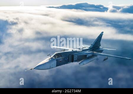 Su-24M frontline bomber plane of the Russian Navy flying over Kaliningrad Region, Russia. Stock Photo