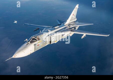 Su-24M frontline bomber plane of the Russian Navy flying in mid-air. Stock Photo