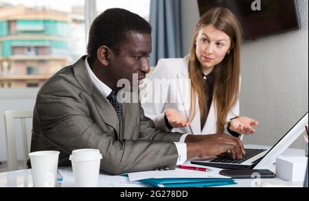 Focused coworkers working together Stock Photo