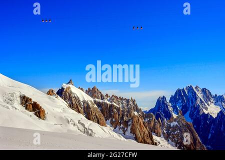 Aiguille du Plan (left) seen from la Vallee Blanche (Mont Blanc cable cars above), France. Stock Photo