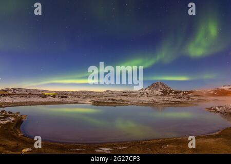 Nothern lights over Lake Myvatn geothermal area, Iceland. Stock Photo