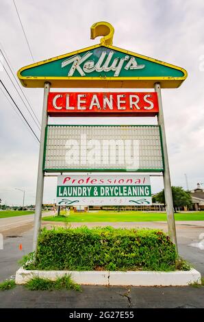 The iconic coat hanger sign of Kelly’s Cleaners is pictured, July 10, 2016, in Mobile, Alabama. The dry cleaners has been in business since 1946. Stock Photo