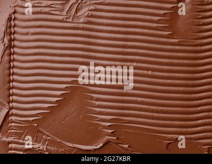 melted chocolate cream  background, top view Stock Photo
