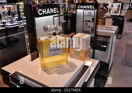 CHANEL PERFUMES ON DISPLAY INSIDE THE COIN FASHION STORE Stock