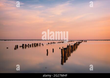 Sunset landscape of the pink salt lake on beautiful sky background Stock Photo