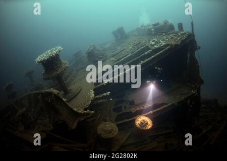 Diver exploring the RMS Justicia shipwreck off Malin Head, Ireland. Stock Photo