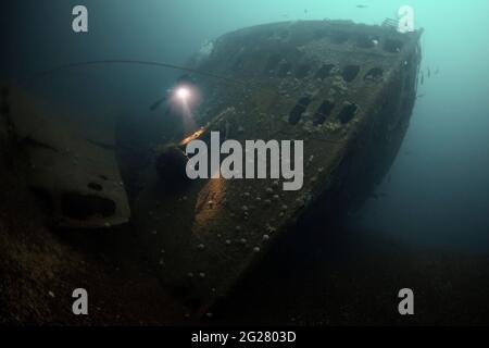 Diver exploring the RMS Justicia shipwreck off Malin Head, Ireland. Stock Photo