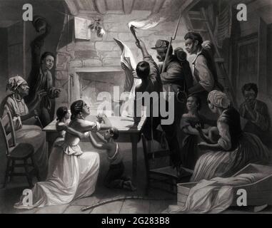 The proclamation reaches the South where a family of slaves receives news of their emancipation. Stock Photo