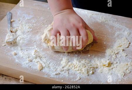 hand kneading bread dough, norfolk, england Stock Photo