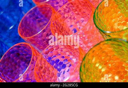 colourful multi-coloured plastic beakers background Stock Photo
