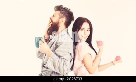 Couple, Family On Sleepy Faces, Yawning In Clothes For Sleep Looks Sleepy  In Morning. Insomnia Concept. Couple Hold Hands Together, Isolated On White  Background. Couple In Love In Pajama, Bathrobe. Stock Photo