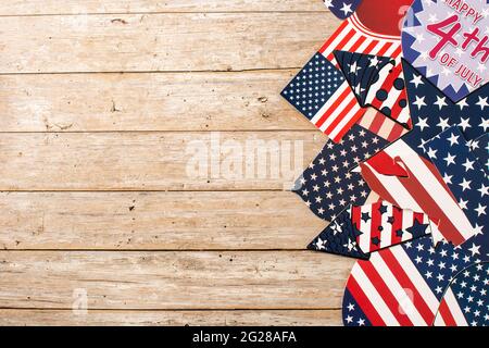 Happy 4th July ornament on wooden background Stock Photo