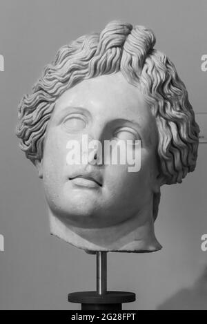 Black and white photo of head of ancient roman statue of a young person Stock Photo