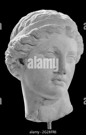 Black and white photo of head of ancient roman statue of young woman Stock Photo