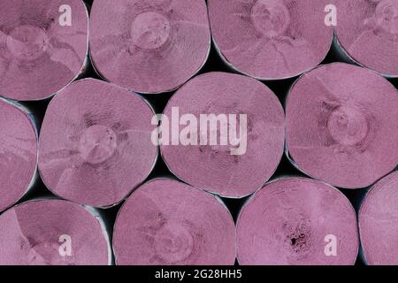 Top view of many rolls of pink soft toilet paper. Family Multipack. Background, Close-up. Stock Photo