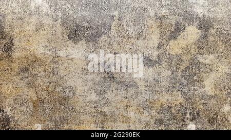 Brown, gray and gold dirty concrete wall plaster texture. Decorative paint for walls or grunge style background. Decorative plaster. Stock Photo
