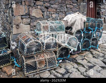 Lobster pots on the jetty at Croig harbour on the Isle of Mull Stock Photo