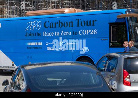 London, UK. 9th June, 2021. Fully carbon neutral battle bus outside the houses of Parliament as part of the zero carbon tour UK in support of the UN-backed Race to Zero campaign. This is the world's largest alliance of actors committed to halving global emissions by 2030 and achieving net zero emissions by 2050 at the latest. Credit: Ian Davidson/Alamy Live News