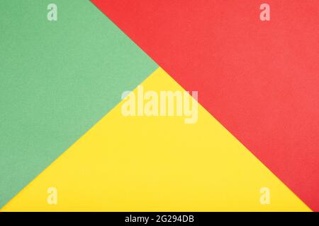 vibrant color paper background in red green and yellow Stock Photo