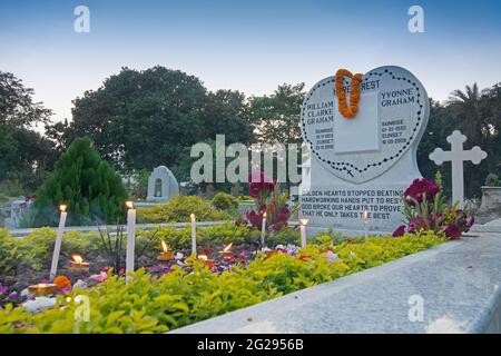 KOLKATA, WEST BENGAL , INDIA - NOVEMBER 2ND 2014 : 'All souls day' remembrance at old cemetery at south Park Street, Kolkata. Religious event. Stock Photo