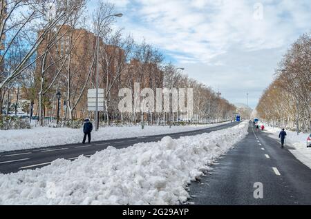 MADRID, SPAIN – JANUARY 10, 2021: Streets of Madrid blanketed with the heaviest snowfall in 50 years, after Storm “Filomena” Stock Photo