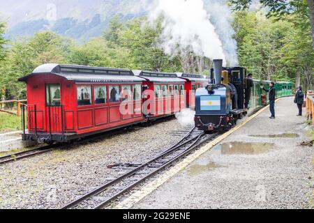 TIERRA DEL FUEGO, ARGENTINA - MARCH 7, 2015: Tourist steam train in National Park Tierra del Fuego, Argentina Stock Photo