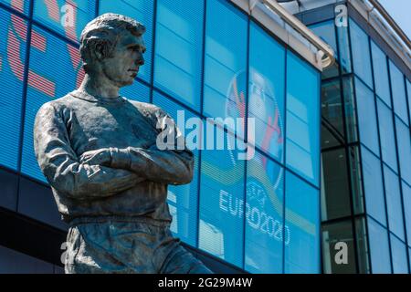 Wembley Stadium, Wembley Park, UK. 9th June 2021.  Bobby Moore Statue, Wembley Stadium ahead of UEFA European Football Championship. Postponed by a year as the Coronavirus pandemic hit worldwide in 2020, the tournament starts on 11th June 2021, with Wembley Stadium hosting it's first match, England v Croatia, on 13th June 2021. Amanda Rose/Alamy Live News Stock Photo