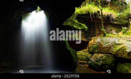 Unique natural waterfall shower  in the Garden of Caves, at Laitmawsiang Village Meghalaya, India. Stock Photo