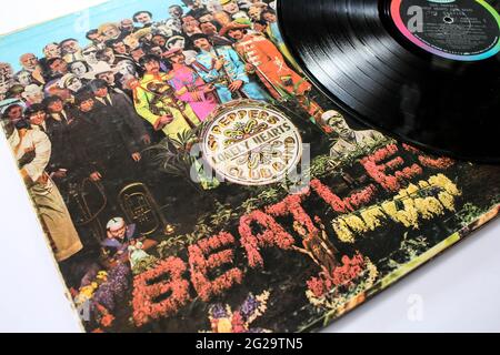 Sgt. Peppers Lonely Hearts Club Band is a record by the English rock band The Beatles. Music album is on a vinyl record LP disc. Psychedelic pop Stock Photo