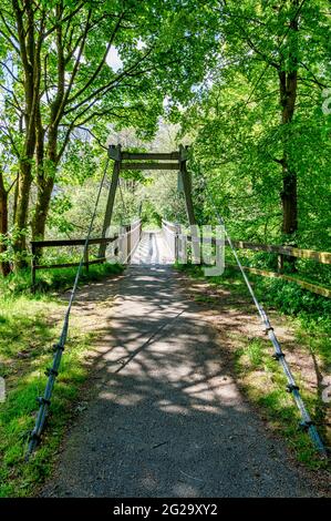 Strathyre pedestrian suspension bridge in the scottish highlands Stock Photo