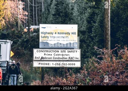 Kennedy Hill, Canada - December 11, 2020:View of road sign about A major upgrade to Highway 4 at Kennedy Hill northeast of the Tofino-Ucluelet Highway Stock Photo