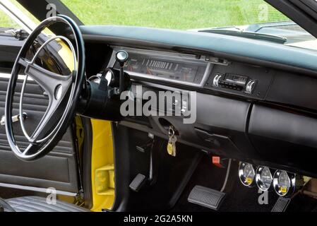 Sunfire Yellow 1969 Plymouth Road Runner Sport Coupe black dashboard Stock Photo