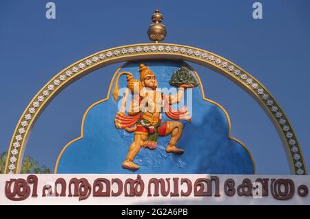 THRISSUR, KERALA, INDIA - Depiction of Hindu god Hanuman over entrance of temple. Stock Photo