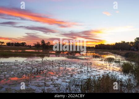Fiery sky at sunset over wetlands near Lake Dunn, a popular tourist destination, near Aramac, Central Queensland, Queensland, QLD, Australia Stock Photo