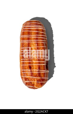 fresh eclair isolated on a white background, hard shadows by the sun top view Stock Photo
