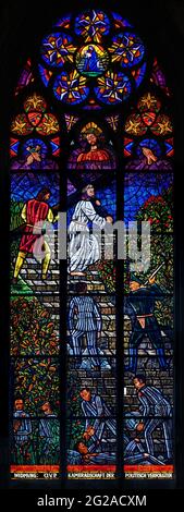 Stained-glass window depicting the Mauthausen concentration camp in Austria. Votivkirche – Votive Church, Vienna, Austria. Stock Photo