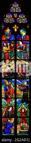 Stained-glass window depicting the evangelization of South America. Votivkirche – Votive Church, Vienna. Stock Photo